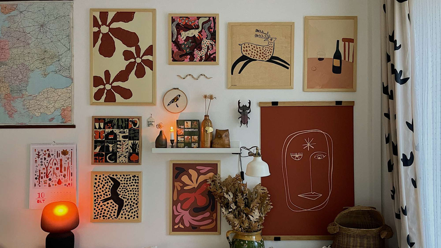 Living room with wall art, a couch, and decorative items.