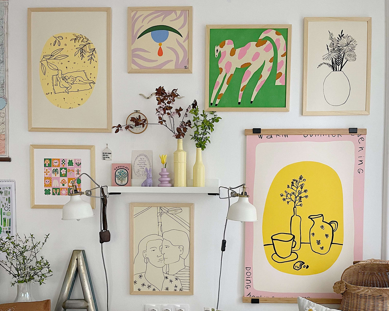 Living room with colorful artwork on the wall, cushions, and a plush toy.